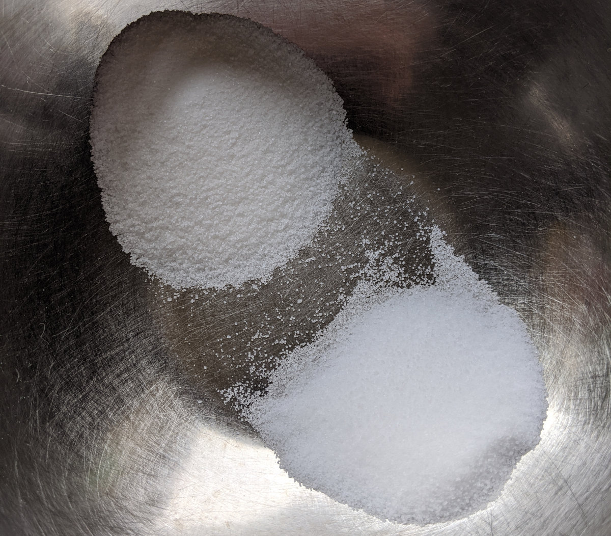 Salt and sugar in steel bowl